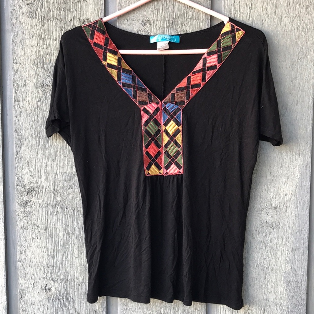 Sweet tee with multi color detail!